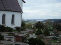 Utsikt fr&aring;n Fj&auml;r&aring;s kyrka mot &Auml;skatorp och Torkilstorp. /Hartwig B. mfl/